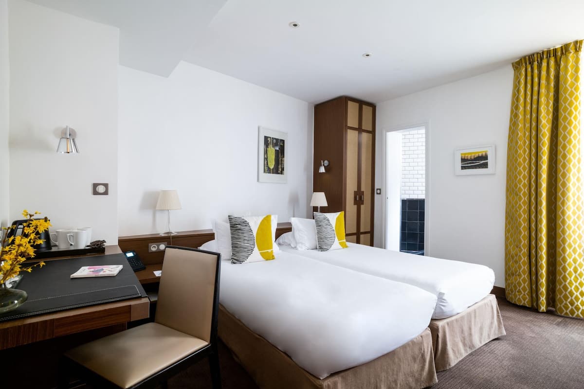 Triple Room | Free minibar items, in-room safe, desk, soundproofing