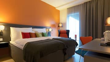 Pillow-top beds, in-room safe, desk, soundproofing