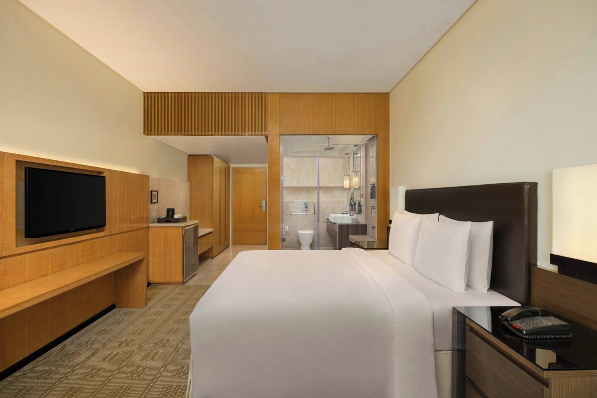 Premium bedding, down comforters, pillowtop beds, minibar