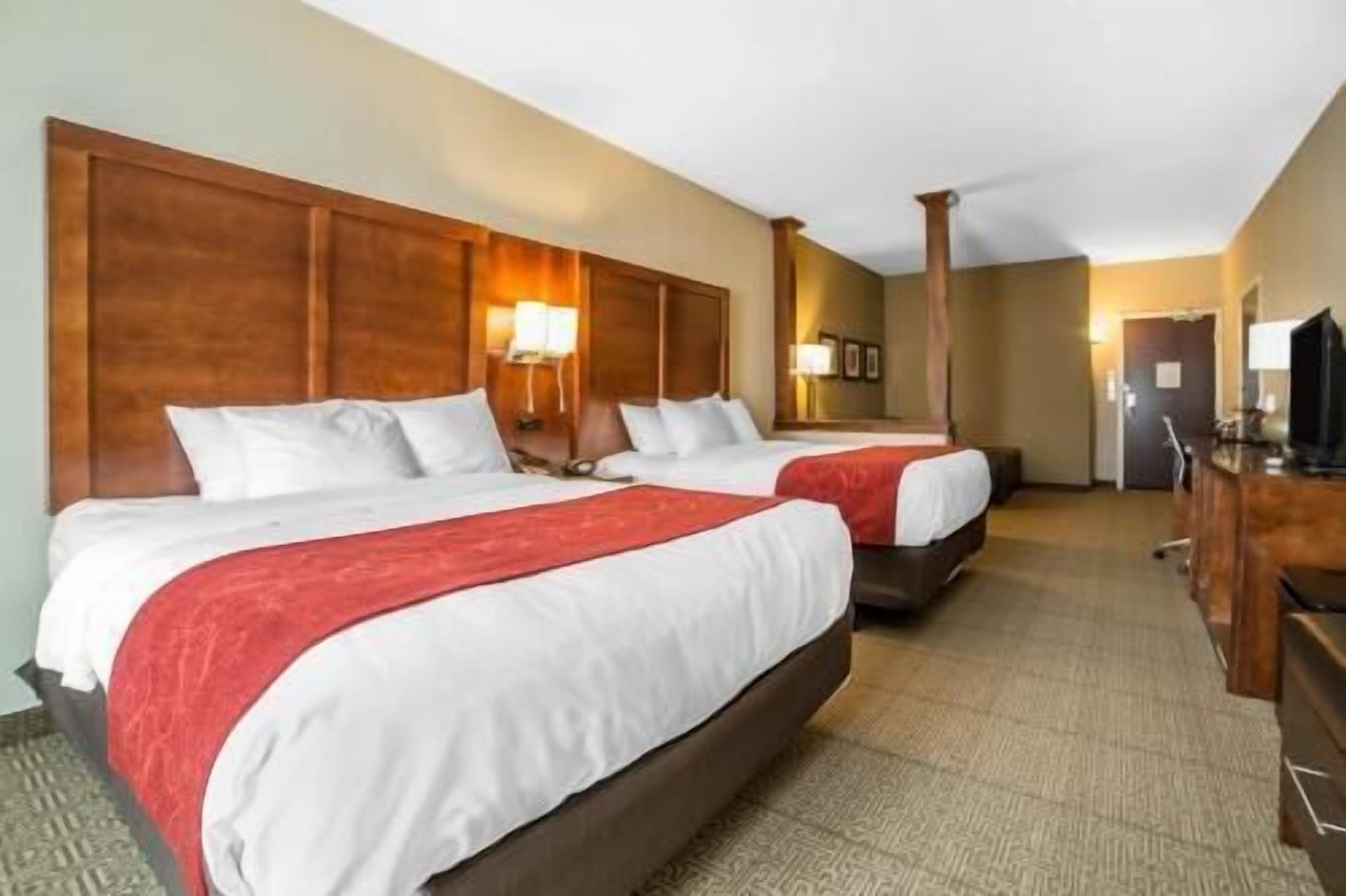 Premium bedding, desk, laptop workspace, iron/ironing board