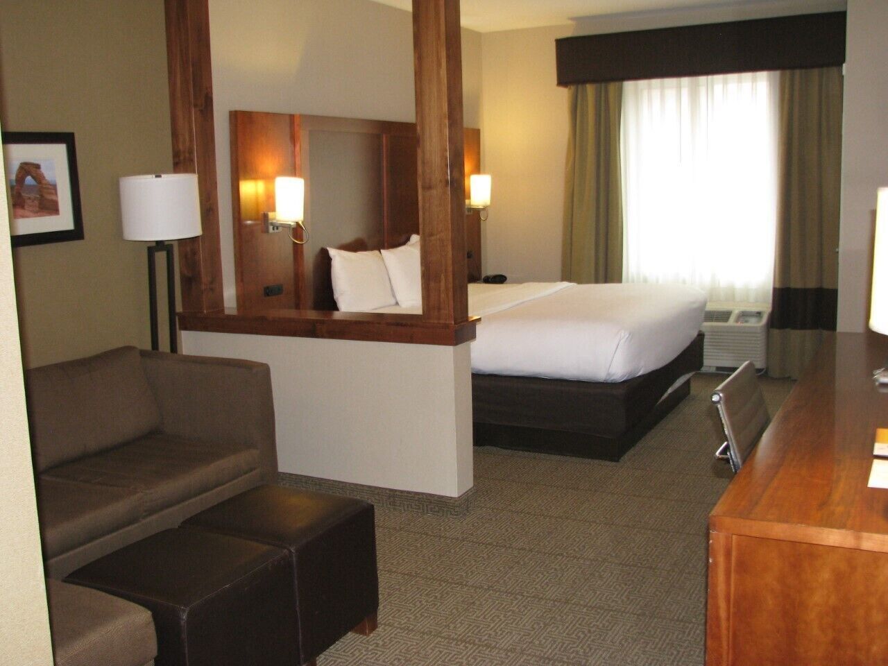 Premium bedding, desk, laptop workspace, iron/ironing board