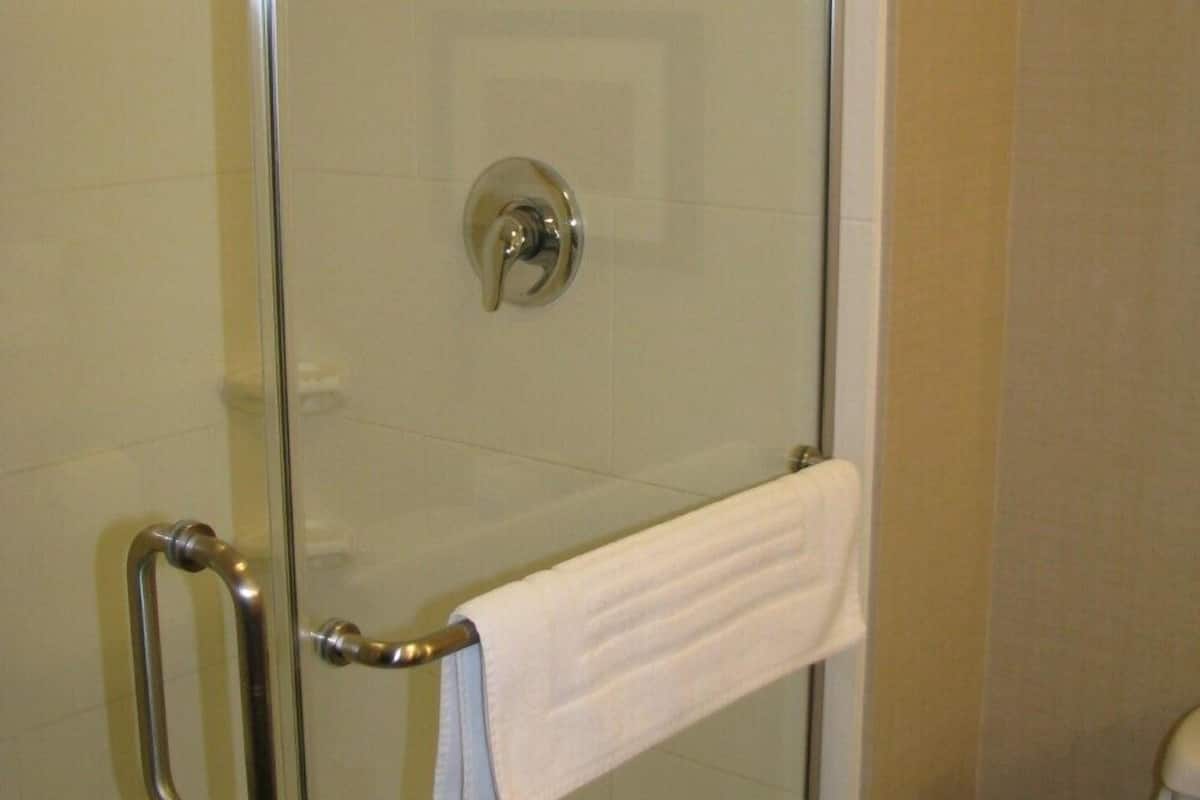 suite, 1 king bed with sofa bed, non smoking | bathroom | hair dryer, towels