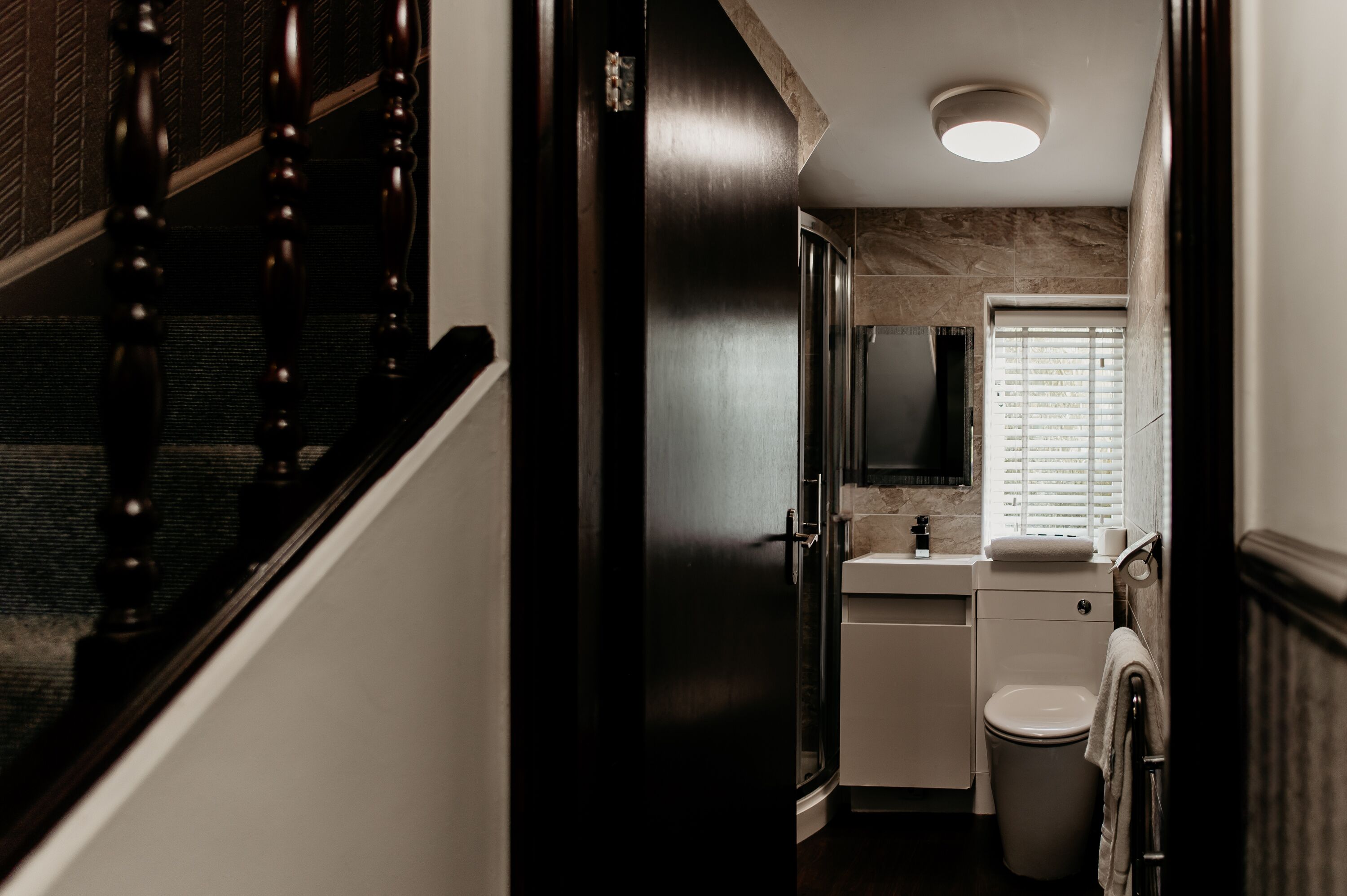 junior suite | bathroom | combined shower/bathtub, hair dryer, towels