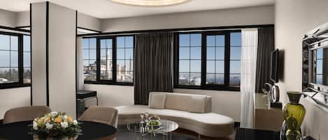 King Suite | Living area | 32-inch LCD TV with cable channels, TV