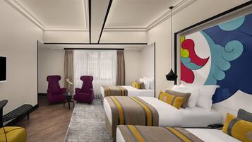 A hotel room with a bed, two armchairs, a small table with a vase, a large abstract painting, and a TV.