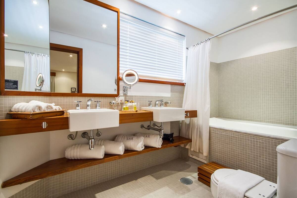 room (top ) | bathroom | free toiletries, hair dryer, bathrobes, slippers