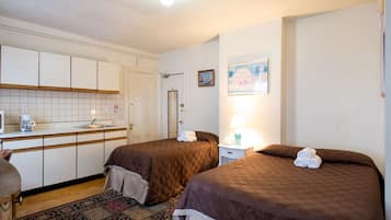 Triple Room (Shared Bath) | In-room safe, laptop workspace, iron/ironing board