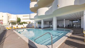 Outdoor pool, open 9 AM to 6:00 PM, pool umbrellas, pool loungers