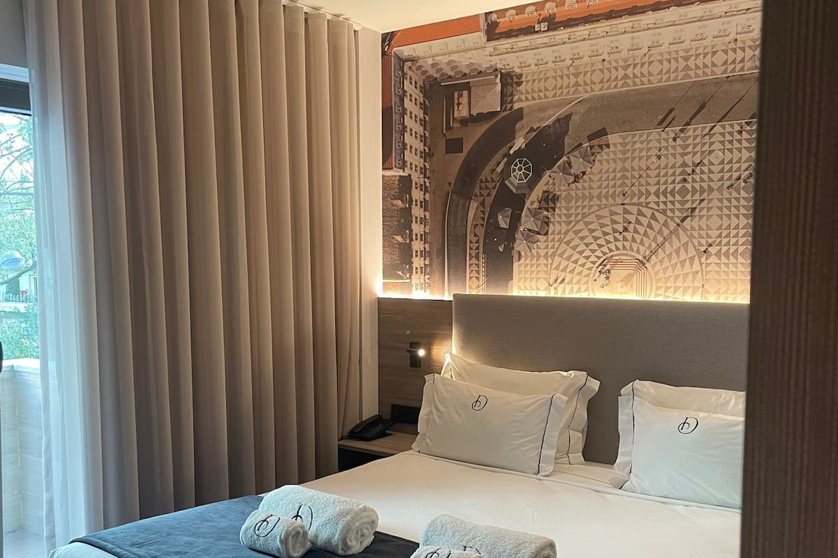 Deluxe Double Room | In-room safe, desk, blackout drapes, iron/ironing board
