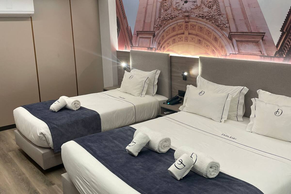 Family Triple Room | In-room safe, desk, blackout drapes, iron/ironing board