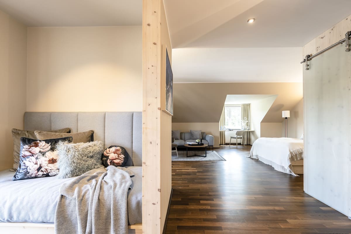 Luxury Studio Suite | Living area | Flat-screen TV, printers