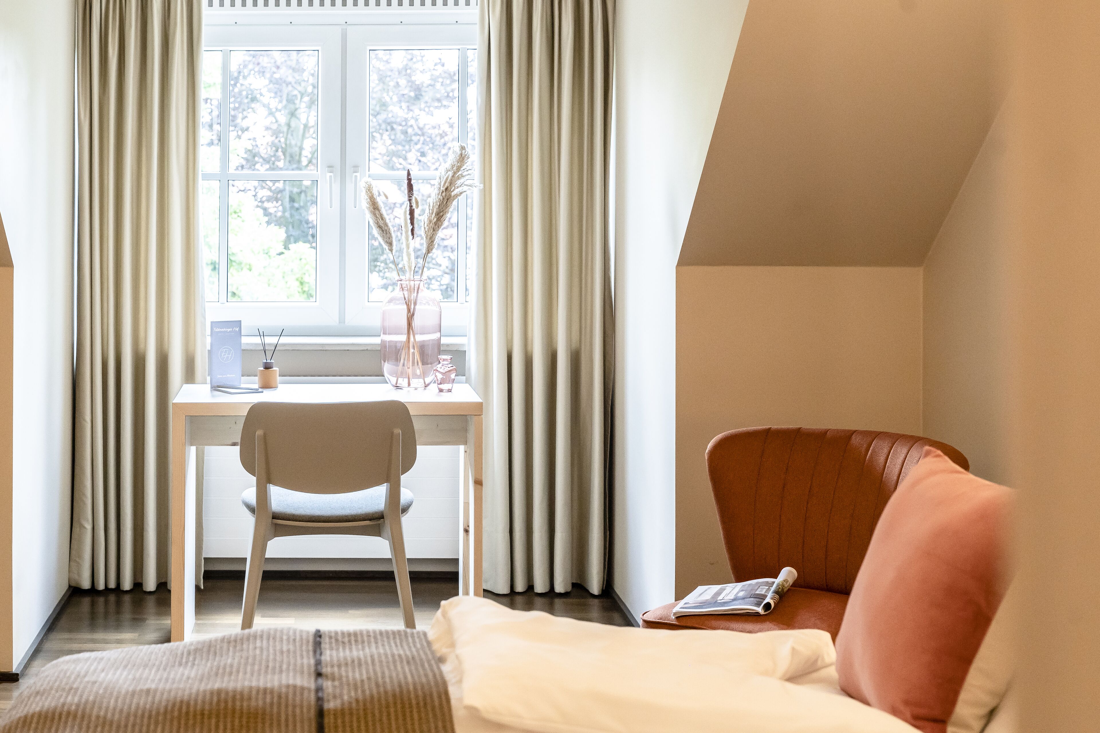 deluxe double room | in-room safe, desk, laptop workspace, blackout curtains