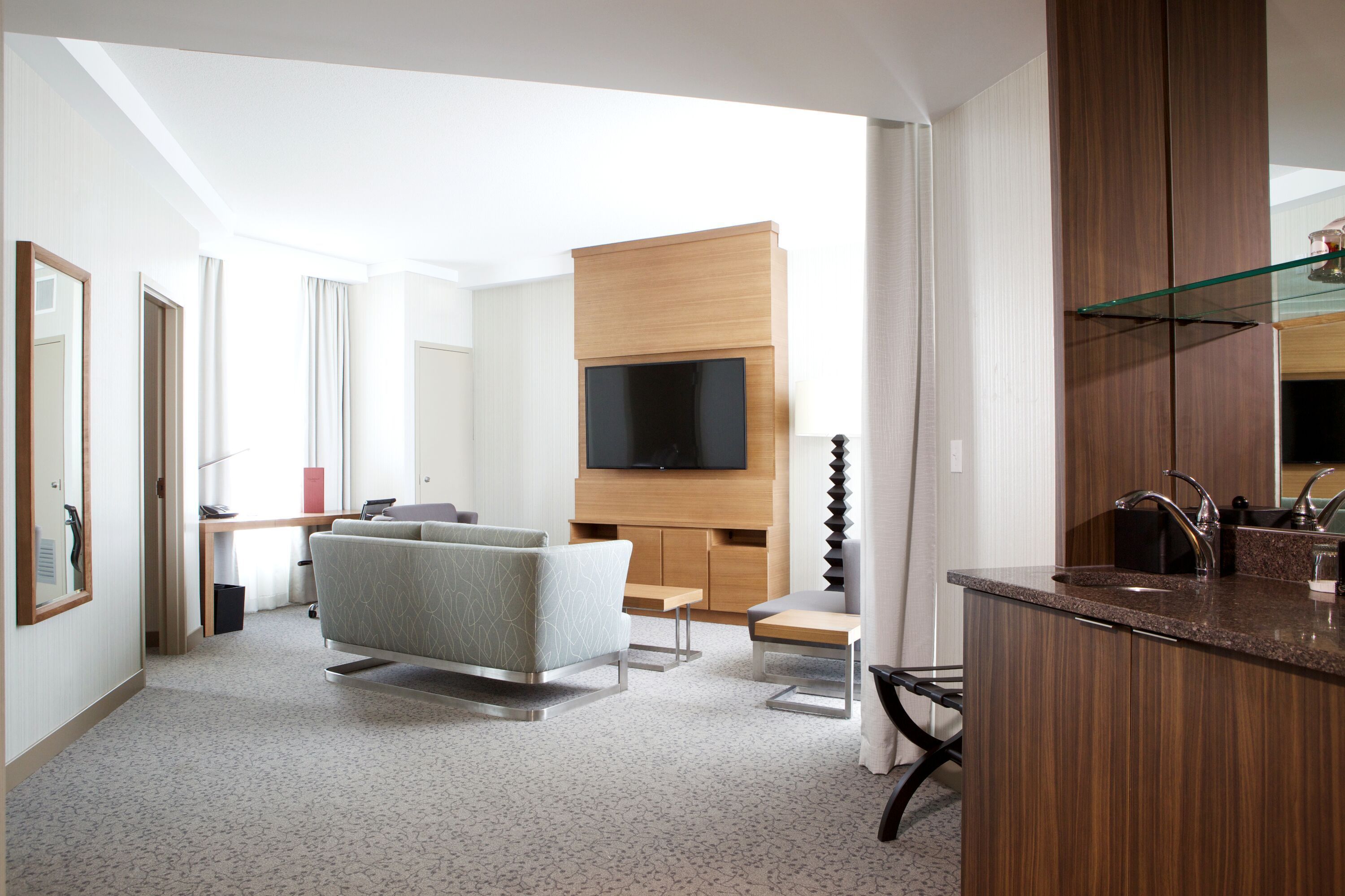 suite, 1 king bed | living area | 47-inch led tv with digital channels, tv, ipod dock