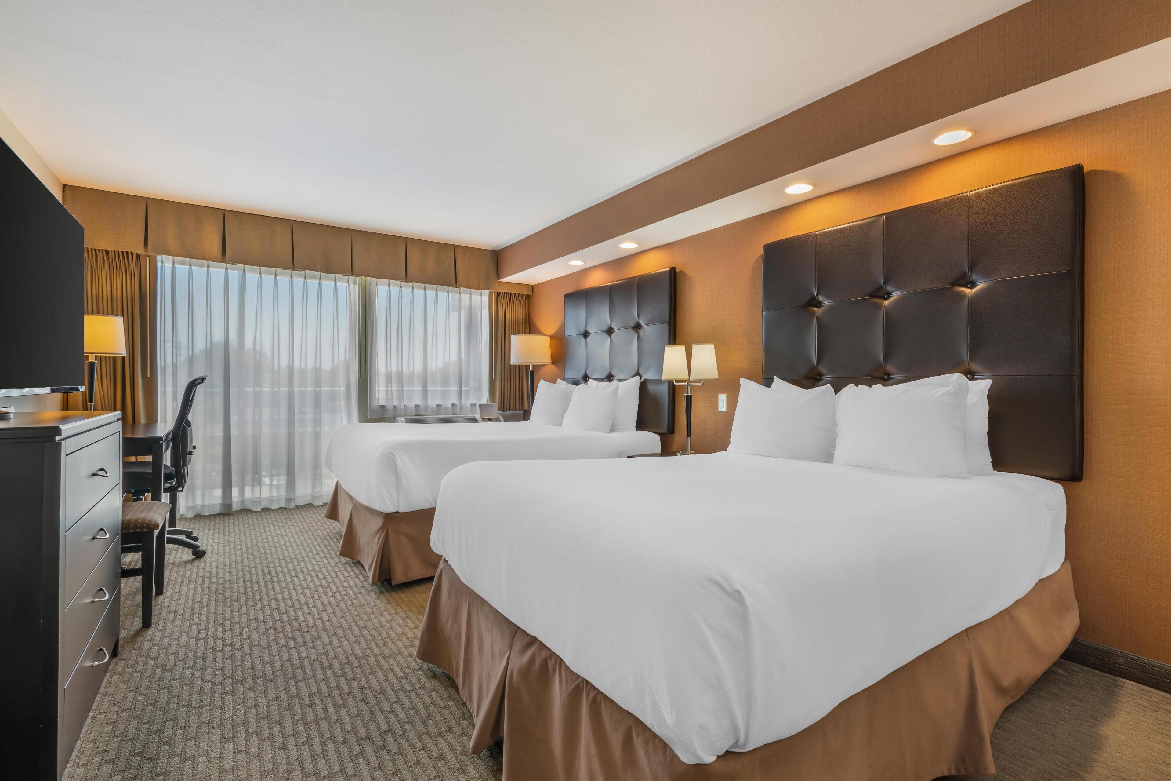 Standard Room, 2 Queen Beds, Non Smoking, Balcony (Shower Only) | Desk, laptop workspace, iron/ironing board, free cribs/infant beds