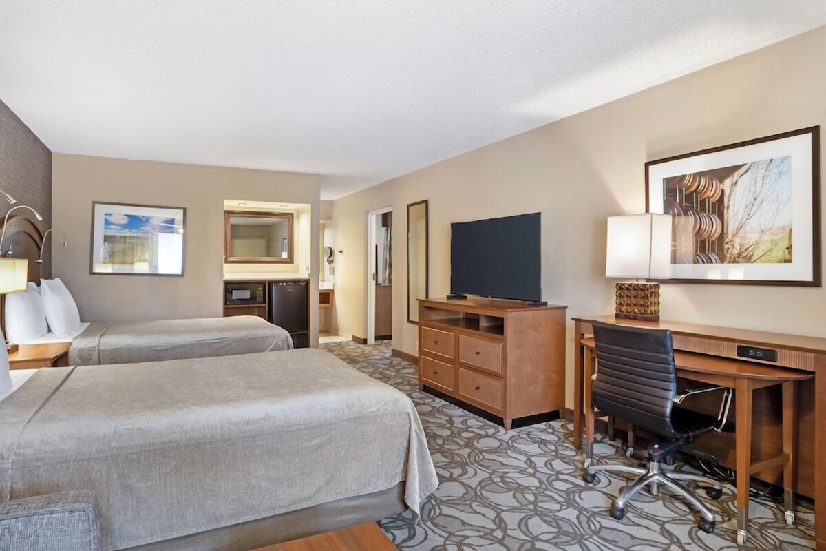 Pillowtop beds, laptop workspace, blackout drapes, iron/ironing board