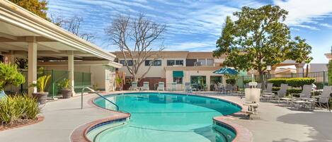 Outdoor pool, open 9:00 AM to 10:00 PM, pool umbrellas, sun loungers