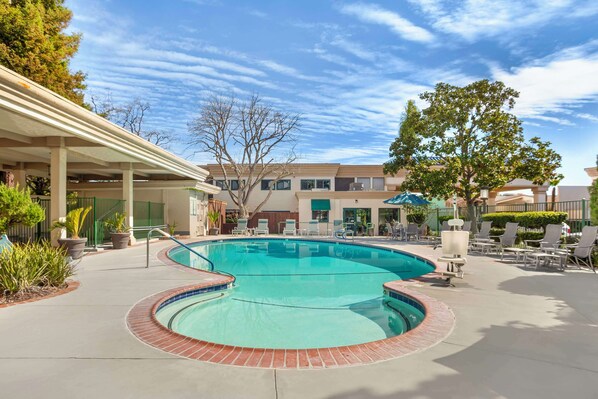 Outdoor pool, open 9:00 AM to 10:00 PM, pool umbrellas, sun loungers