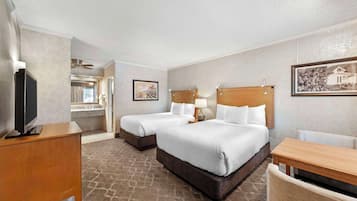 Pillow-top beds, laptop workspace, blackout curtains, iron/ironing board
