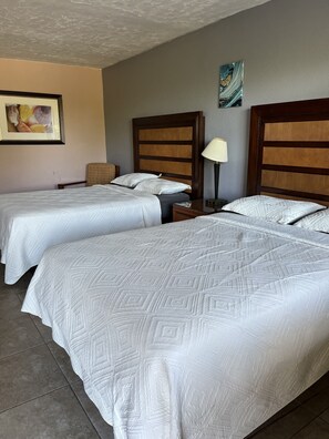 Standard-huone, 2 parisänkyä, tupakointi kielletty | Äänieristys, ilmainen Wi-Fi, vuodevaatteet