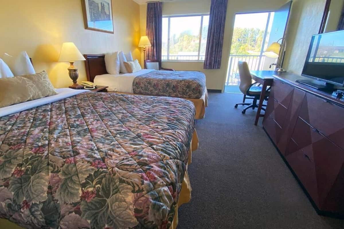 Room, 2 Queen Beds, Non Smoking | Iron/ironing board, bed sheets