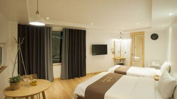 Premium bedding, pillowtop beds, blackout drapes, free WiFi