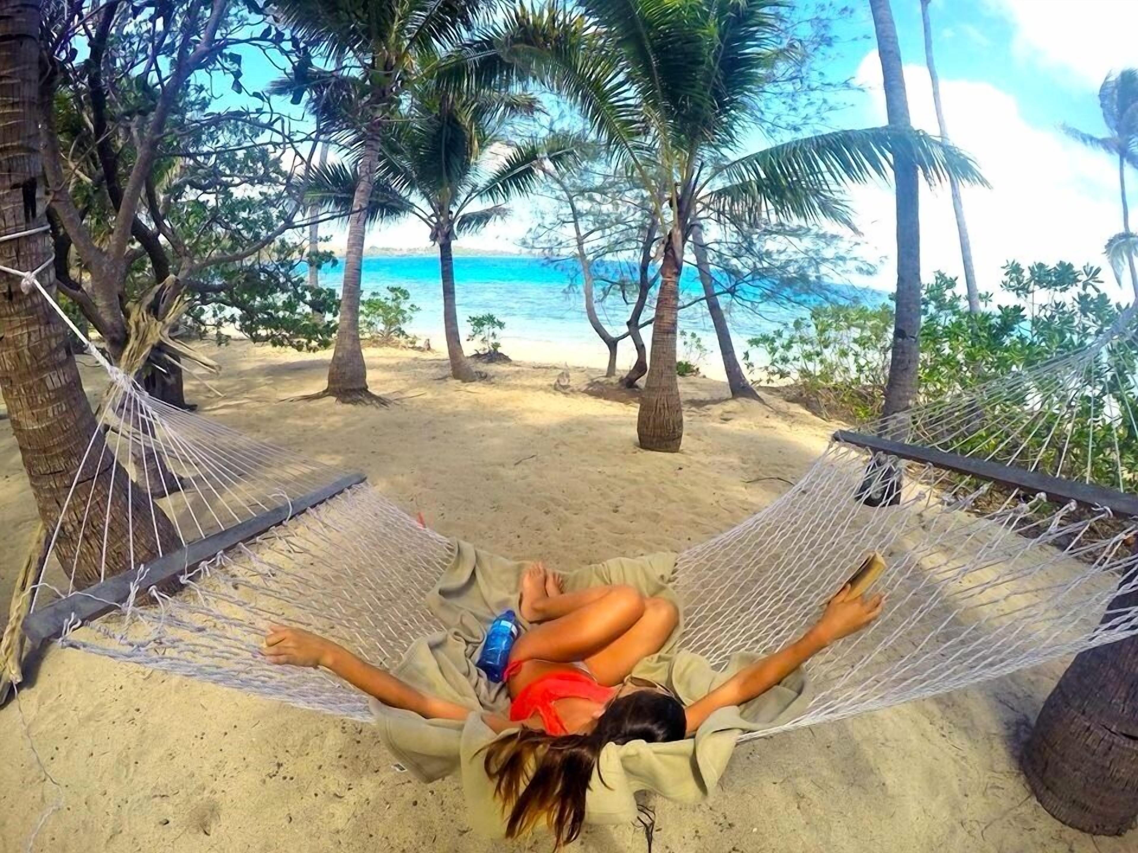 on the beach, white sand, beach towels, scuba diving