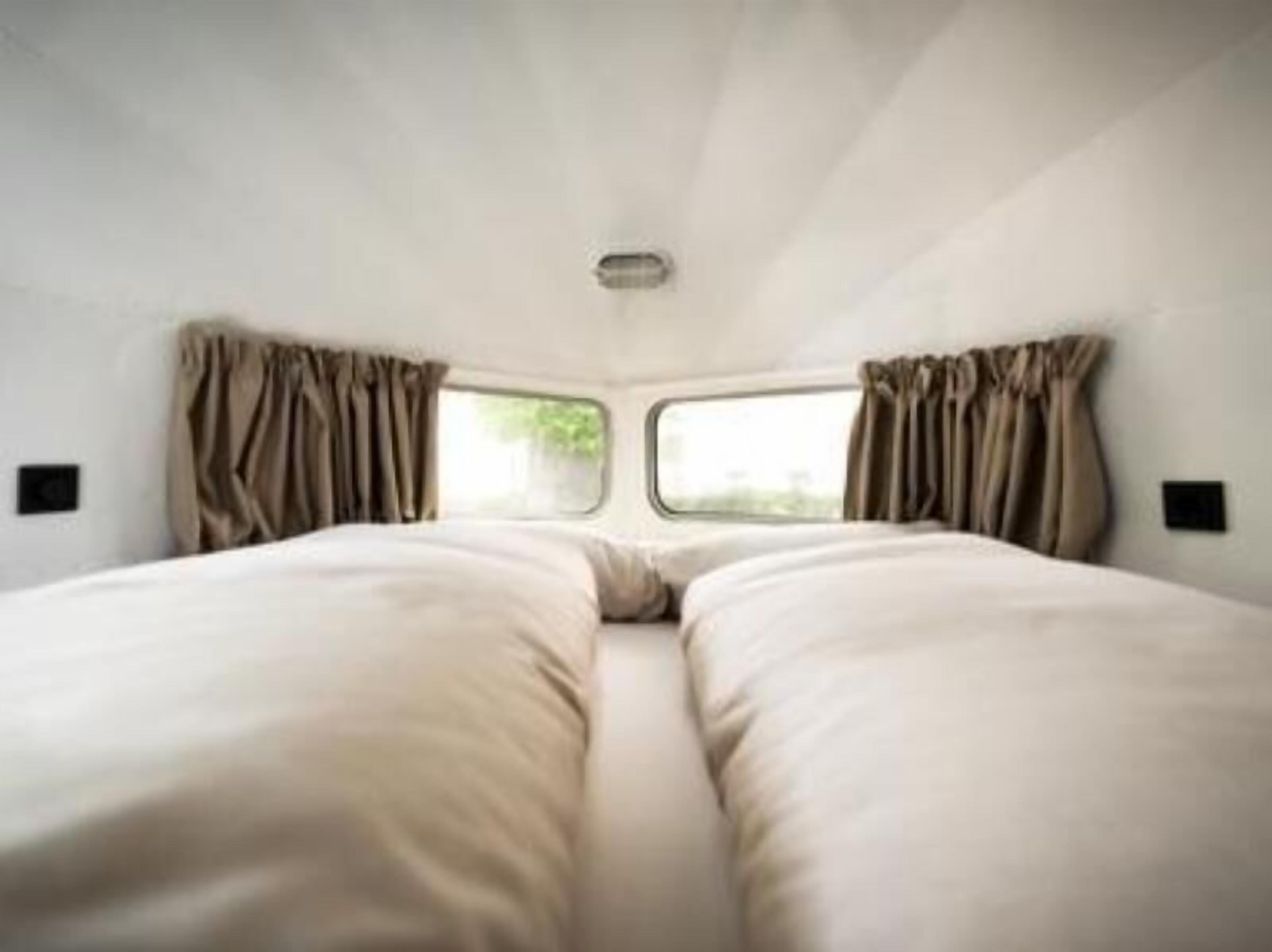 Hypo-allergenic bedding, pillowtop beds, in-room safe, soundproofing