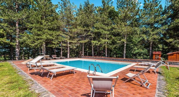 Outdoor pool, open 9 AM to 8:30 PM, sun loungers