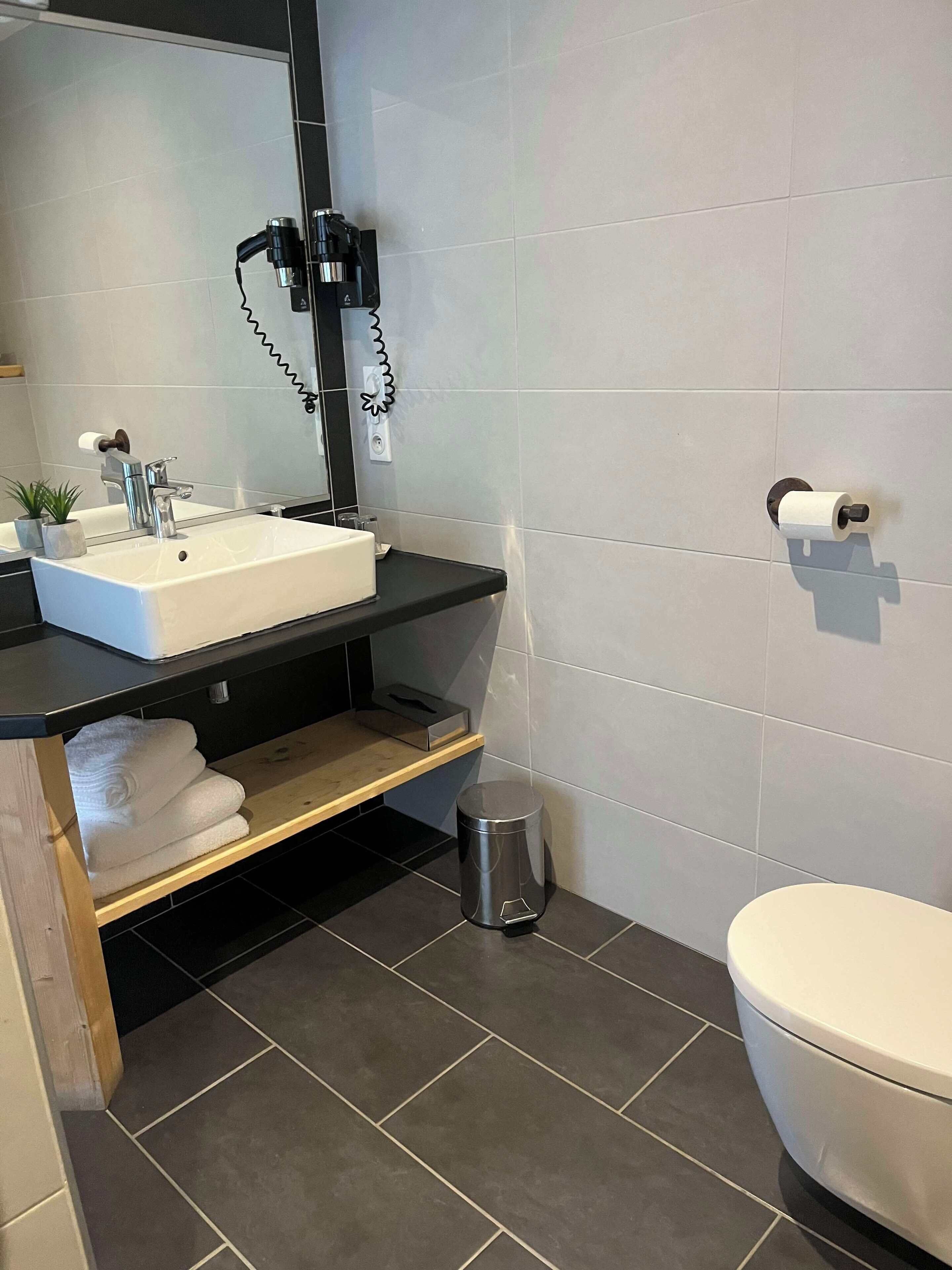 superior quadruple room | bathroom | shower, free toiletries, hair dryer, towels