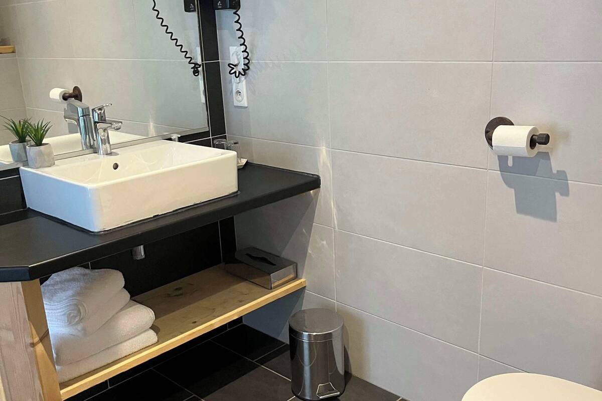 superior quadruple room | bathroom | shower, free toiletries, hair dryer, towels