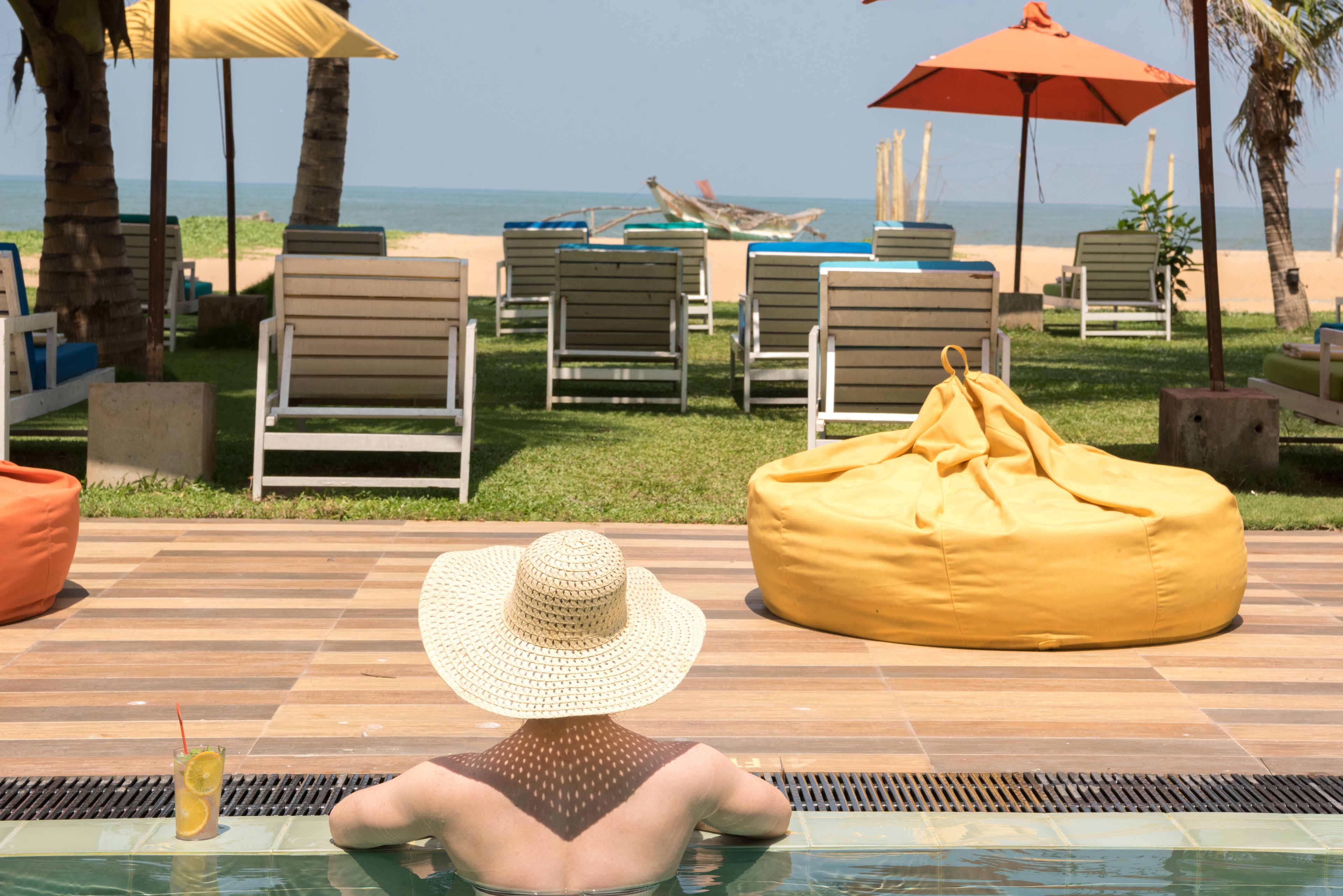 Outdoor pool, pool umbrellas, sun loungers