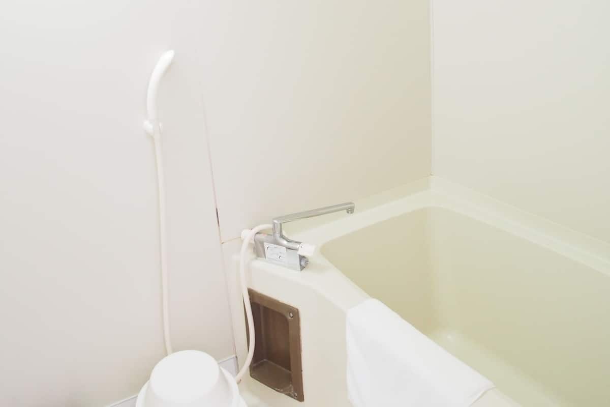 quadruple room, non smoking | bathroom | hair dryer, electronic bidet, towels