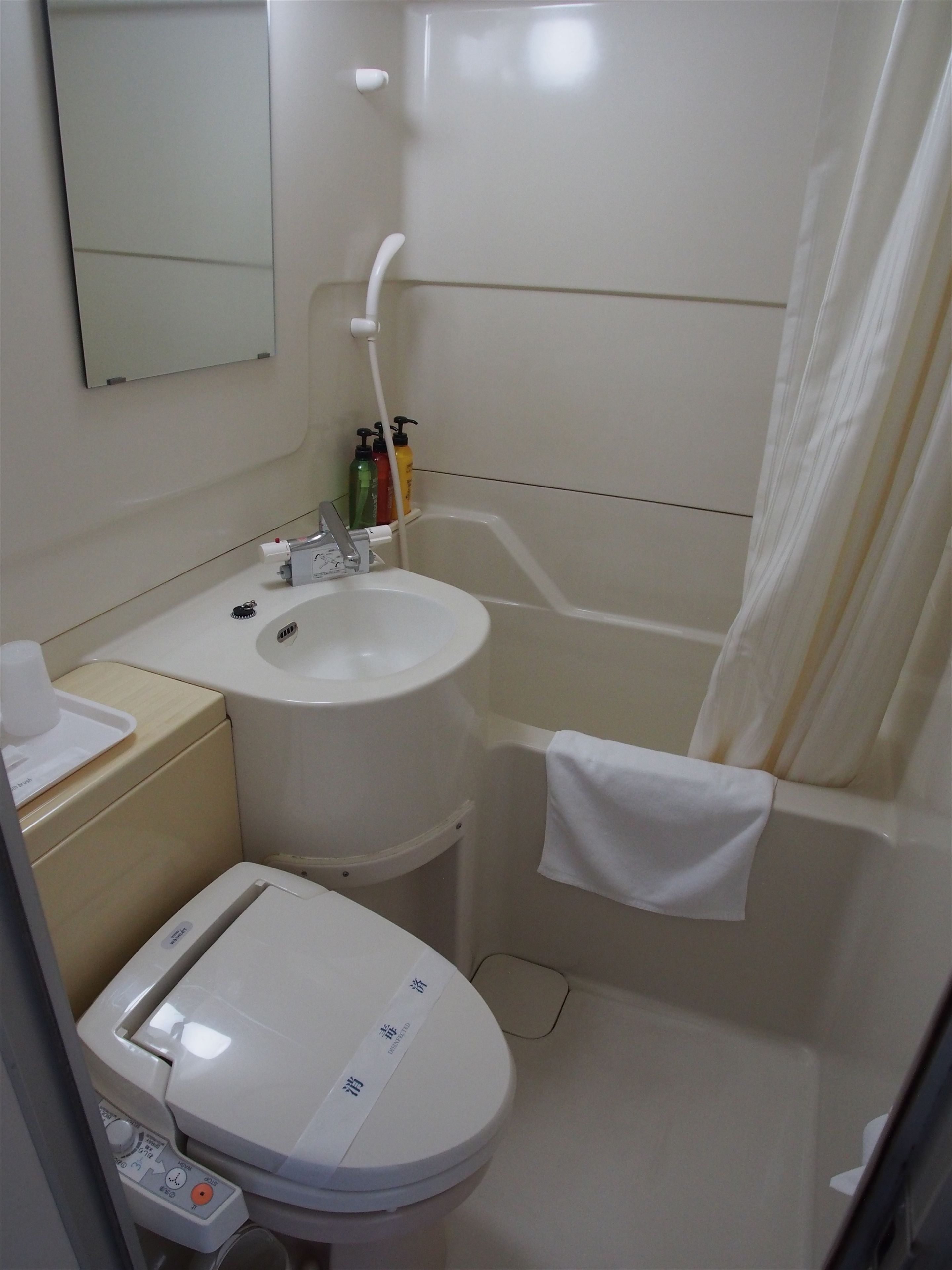 hair dryer, electronic bidet, towels