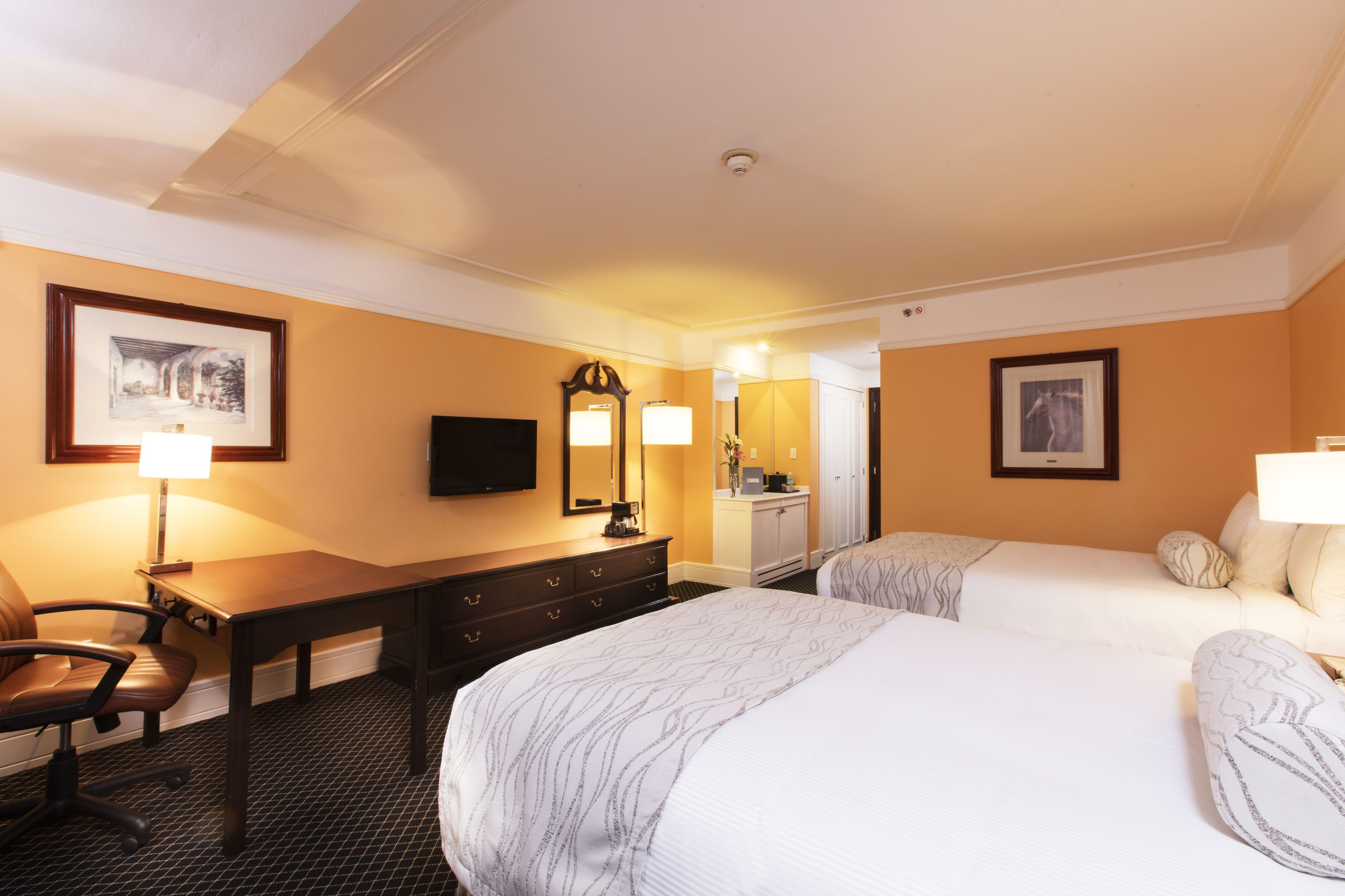 deluxe room, 2 double beds | in-room safe, desk, laptop workspace, soundproofing