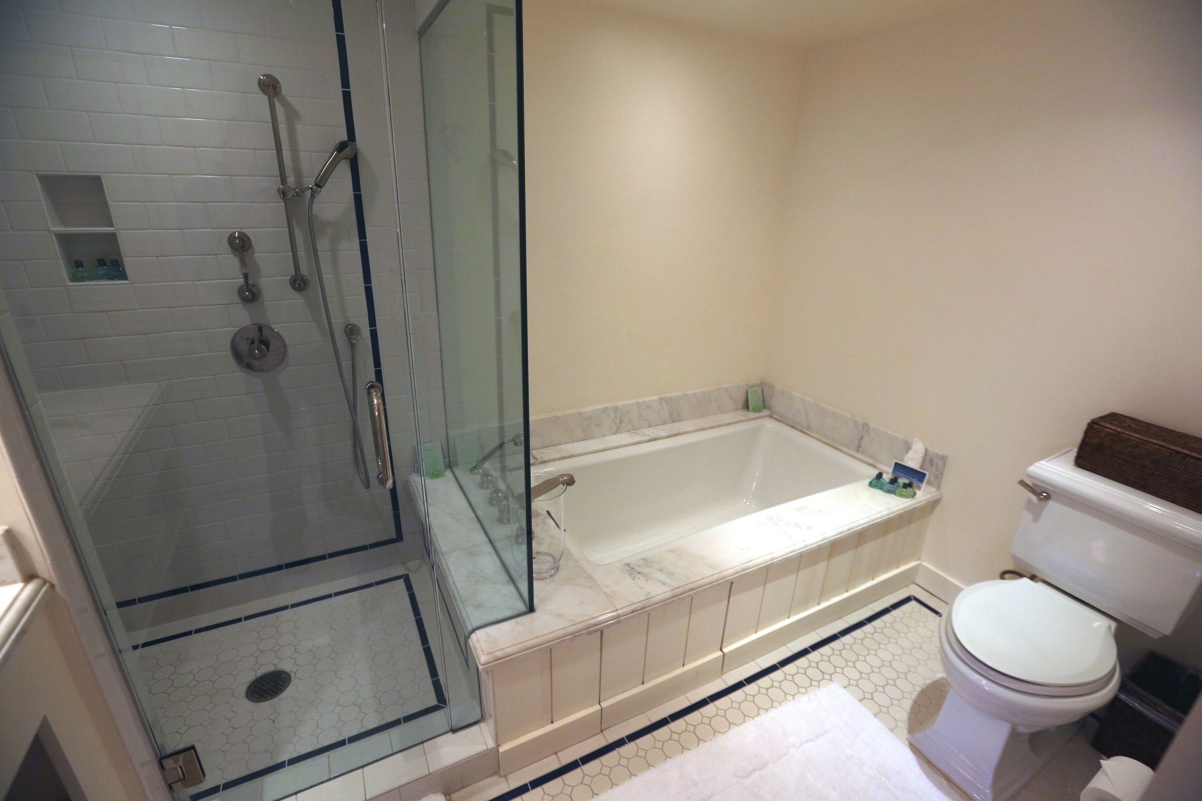suite | bathroom | combined shower/bathtub, designer toiletries, hair dryer, towels