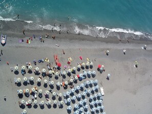 Private beach, free beach shuttle, sun-loungers, beach umbrellas