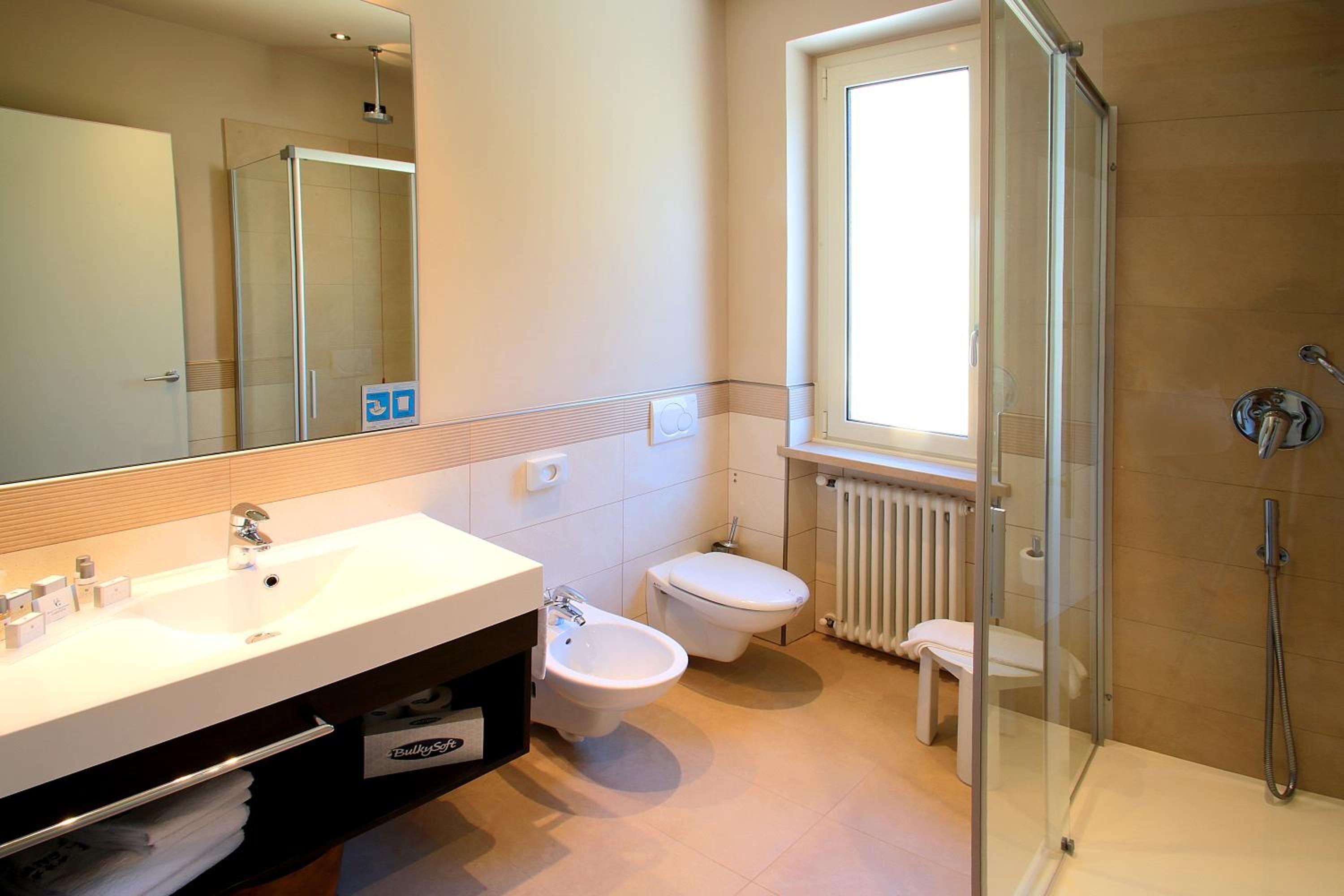 free toiletries, hair dryer, bathrobes, bidet