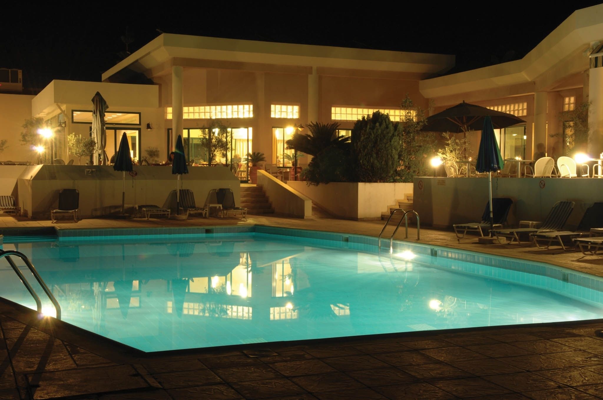 2 outdoor pools, open 9:00 am to 6:30 pm, pool umbrellas, pool loungers