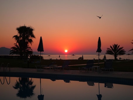 2 outdoor pools, open 9:00 AM to 6:30 PM, pool umbrellas, sun loungers