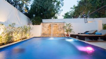 2 outdoor pools, pool umbrellas, pool loungers