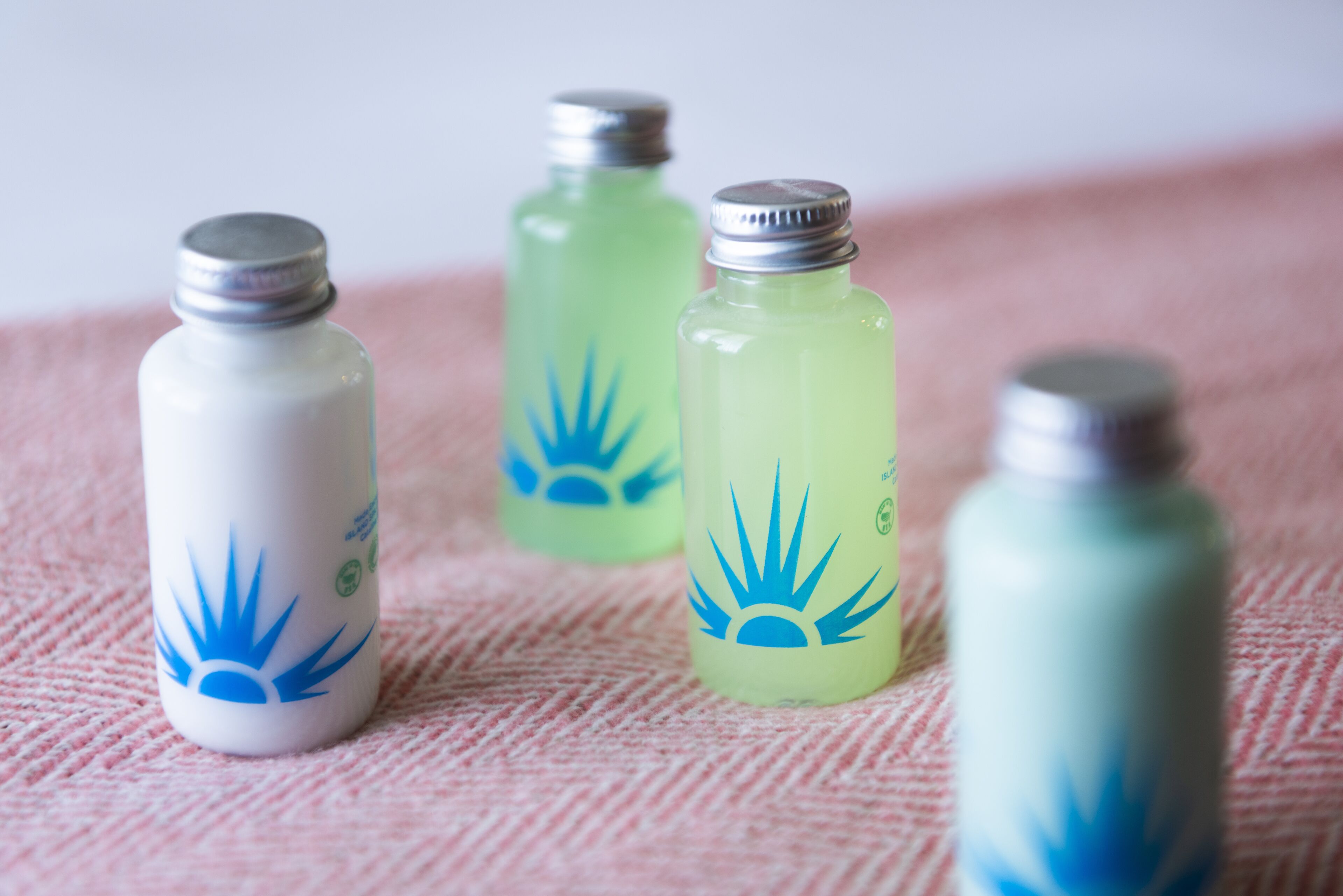 shower, designer toiletries, hair dryer, towels