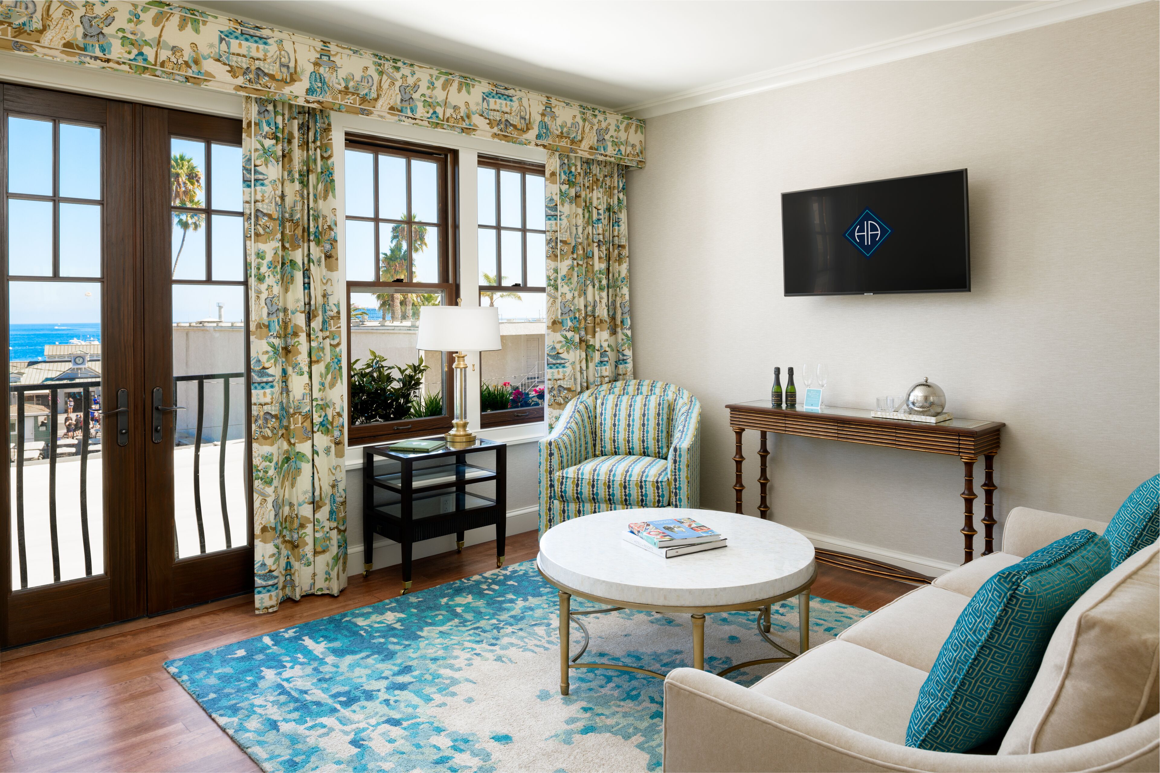 suite (phillip knight) | living area | 55-inch smart tv with cable channels, tv