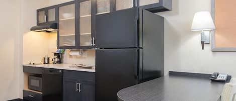 Estudi en suite, 2 llits de matrimoni | Equipament de l'habitació