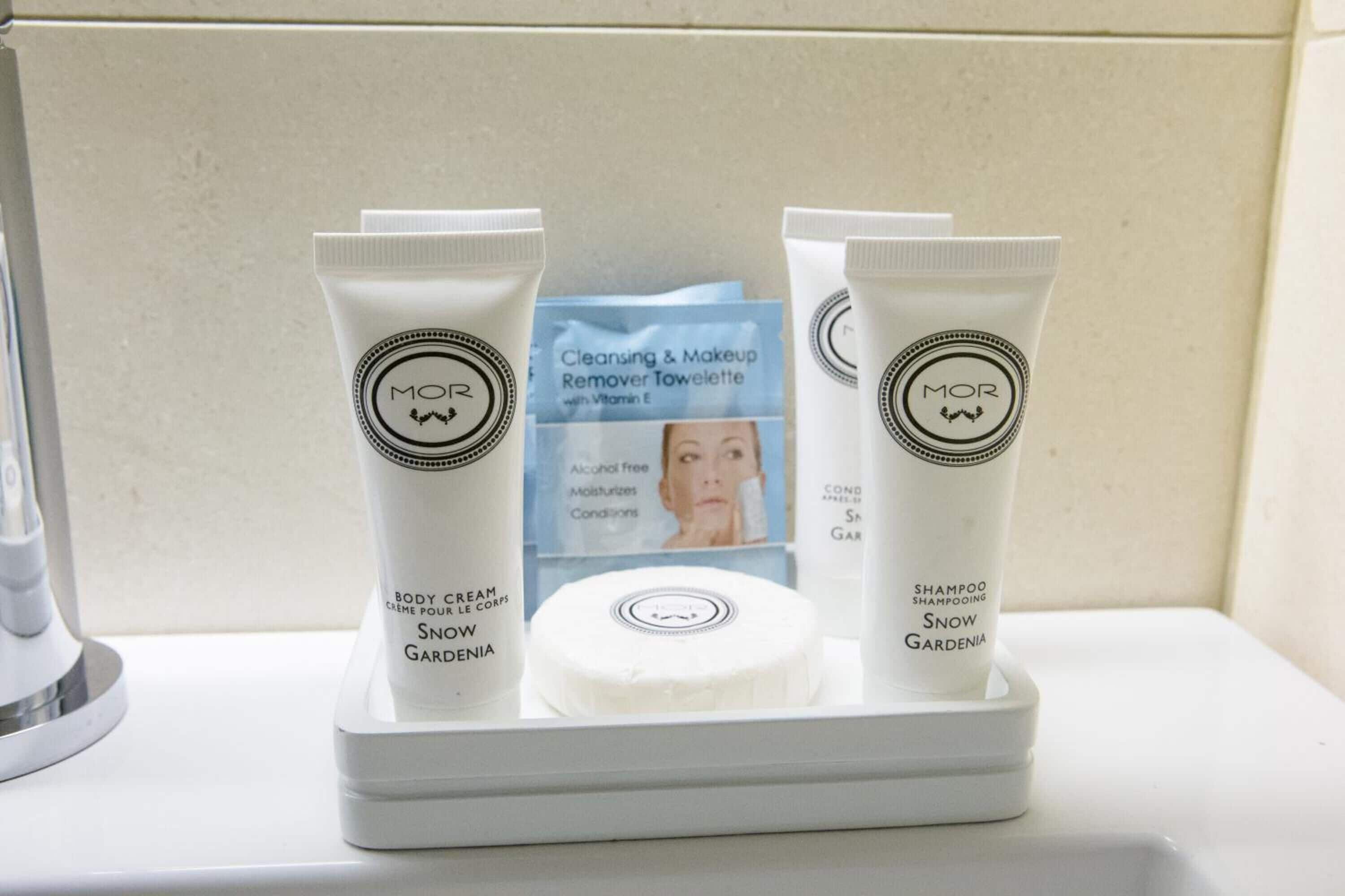 shower, rainfall showerhead, hair dryer, slippers