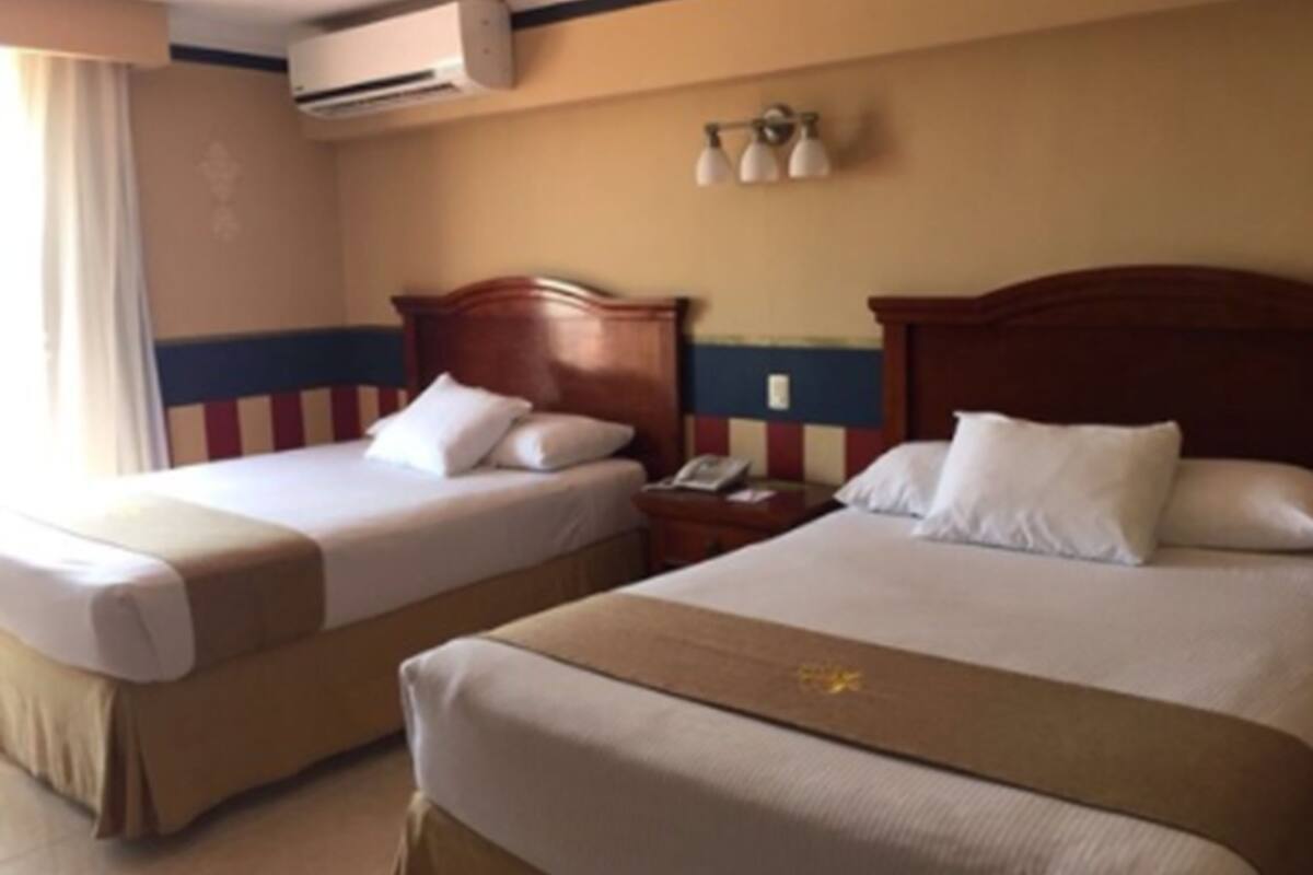 standard room, 2 double beds | 1 bedroom, in-room safe, desk, blackout curtains