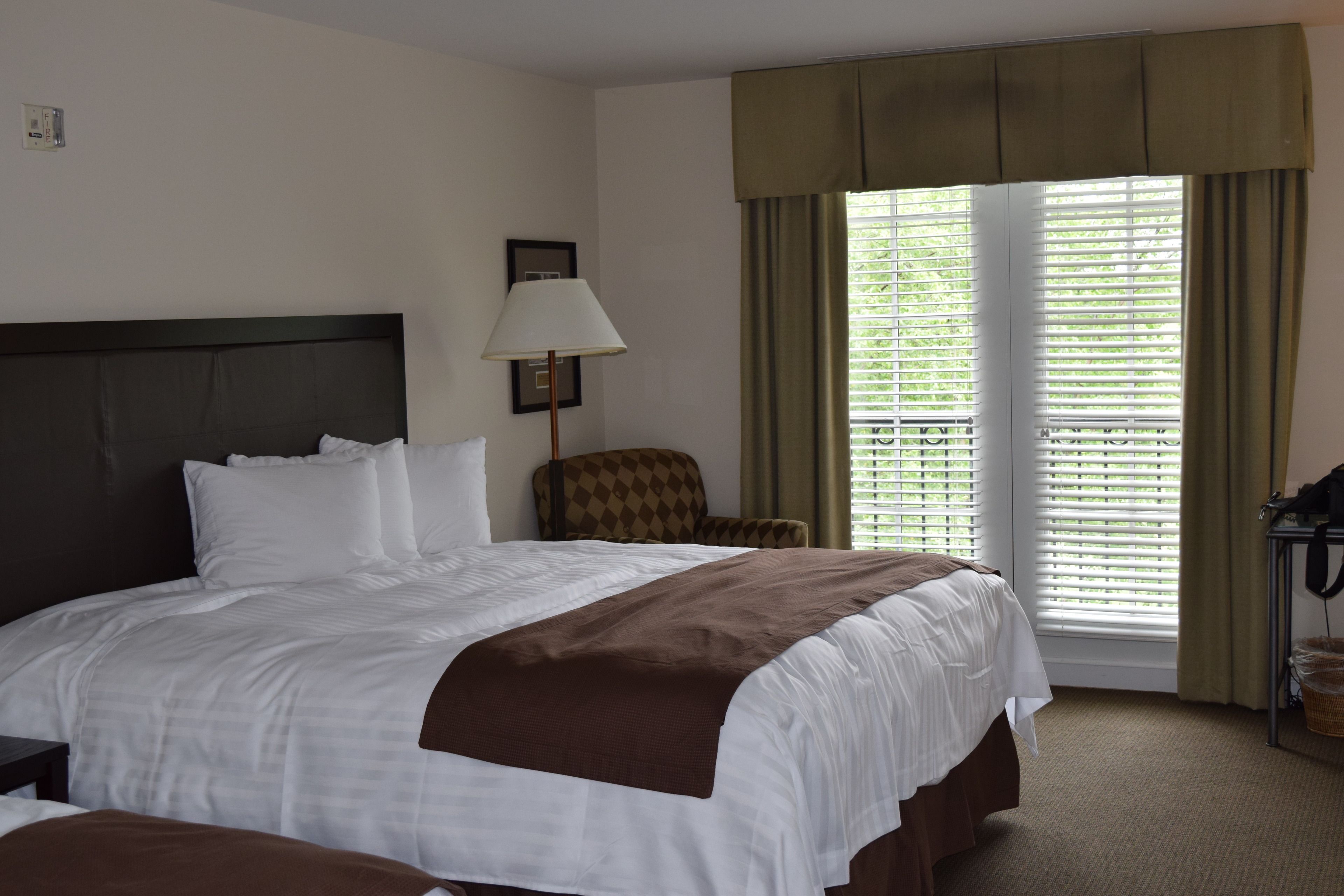 deluxe room, multiple beds | premium bedding, desk, iron/ironing board, travel cot