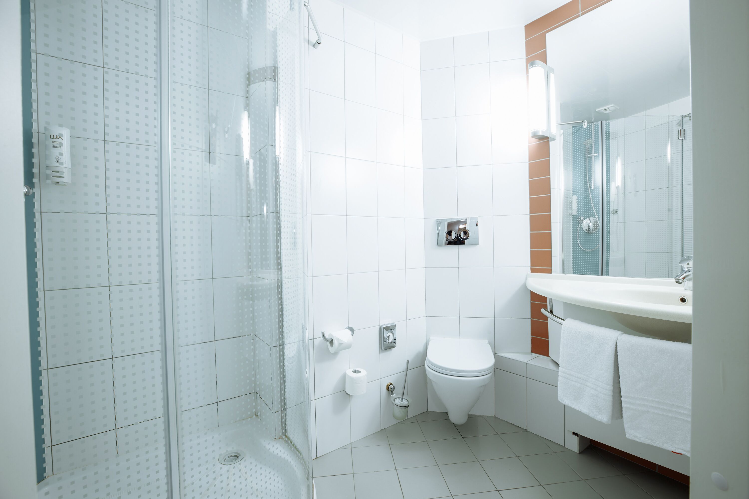 Shower, eco-friendly toiletries, hair dryer, slippers