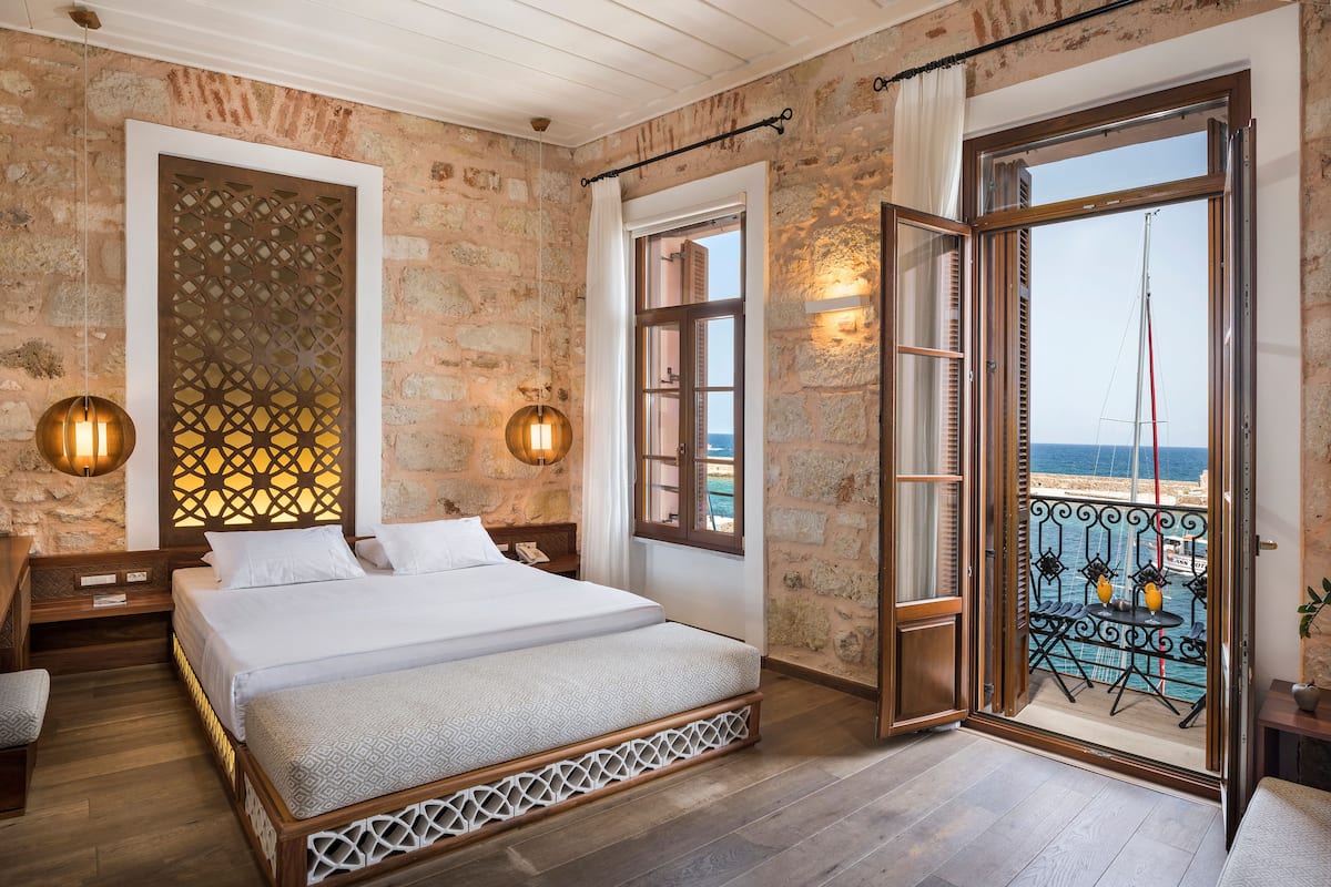 Junior suite, balkon, uitzicht op zee | Lakens van Egyptisch katoen, luxe beddengoed, donzen dekbedden