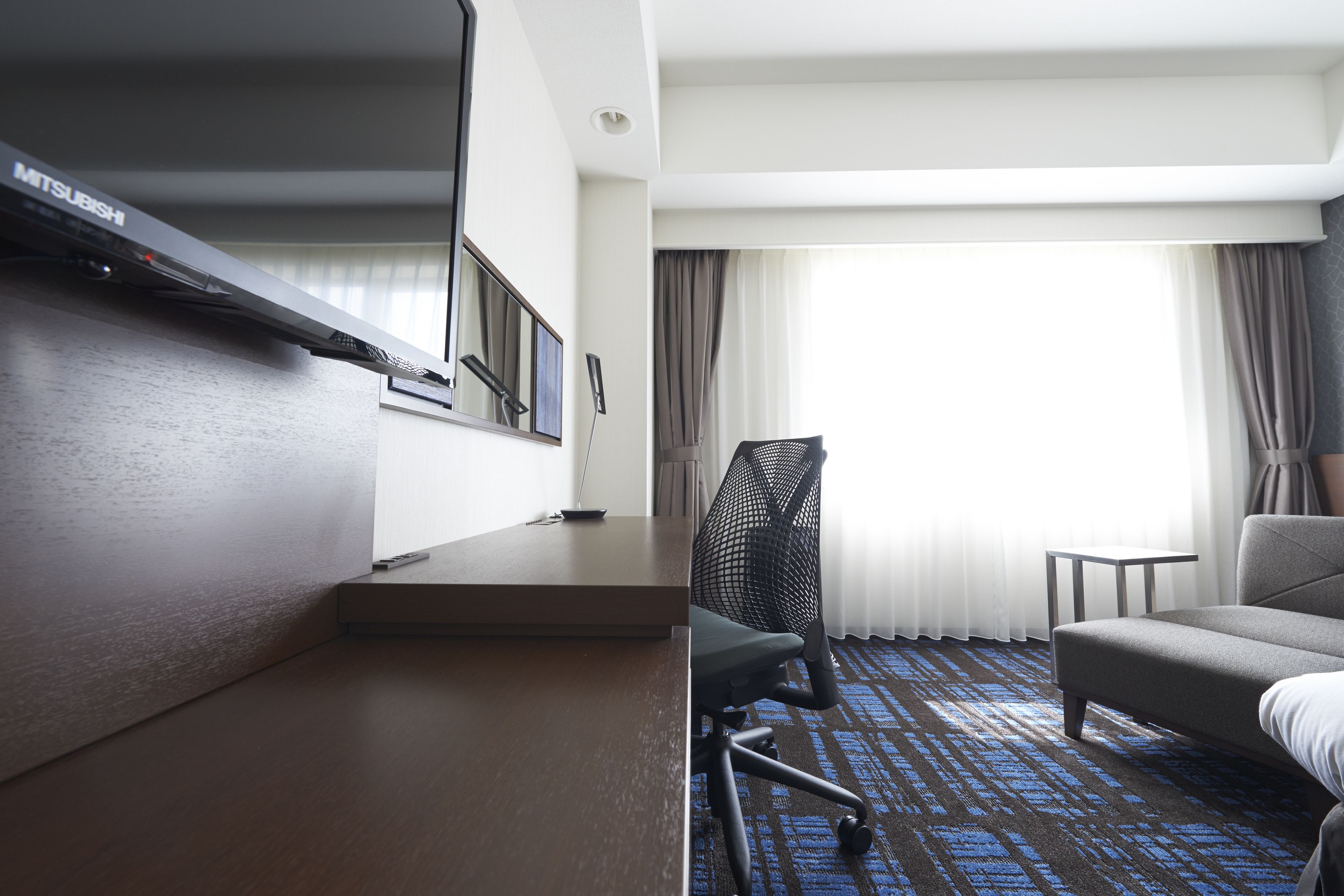 premium bedding, desk, blackout curtains, soundproofing