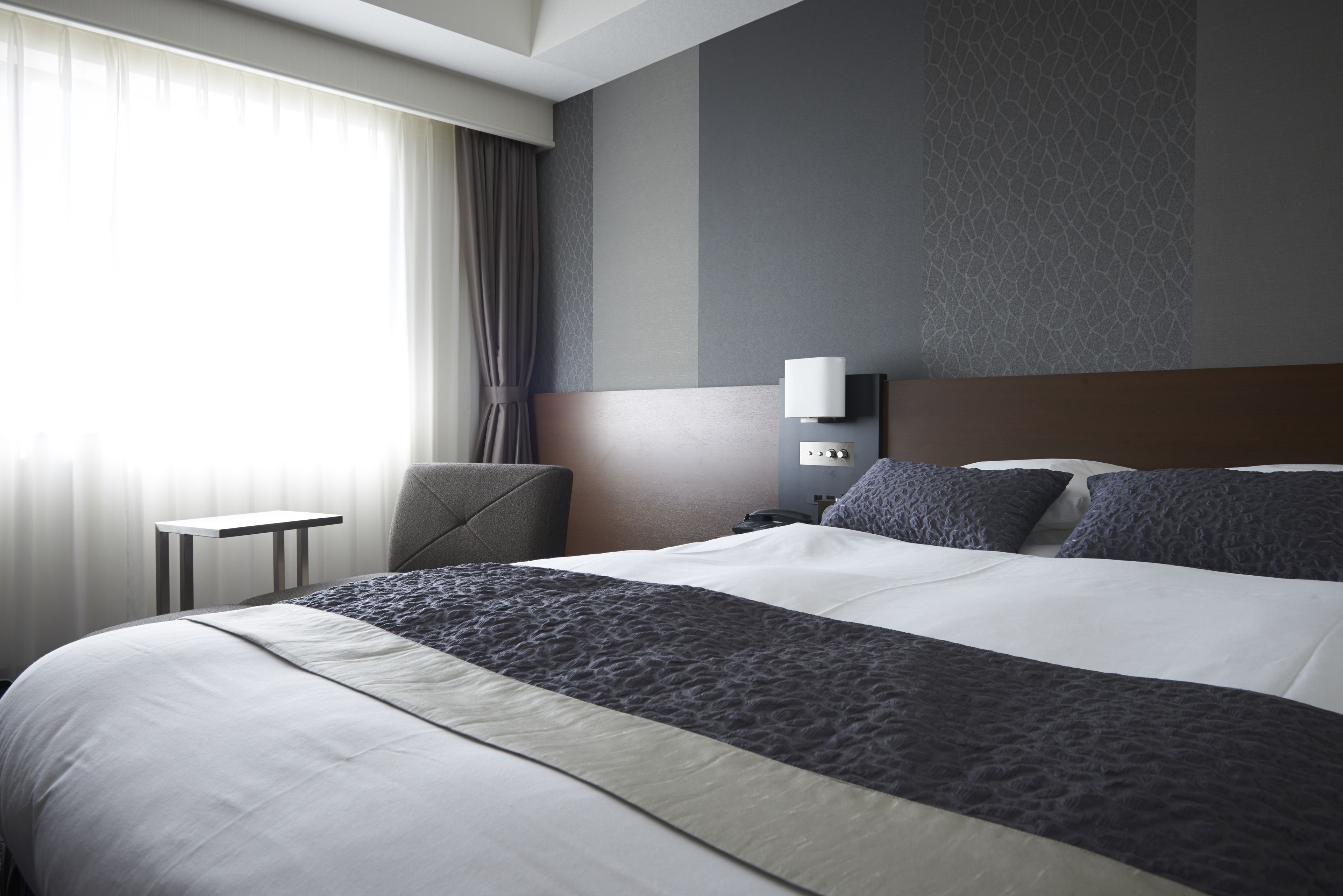 premium bedding, desk, blackout curtains, soundproofing